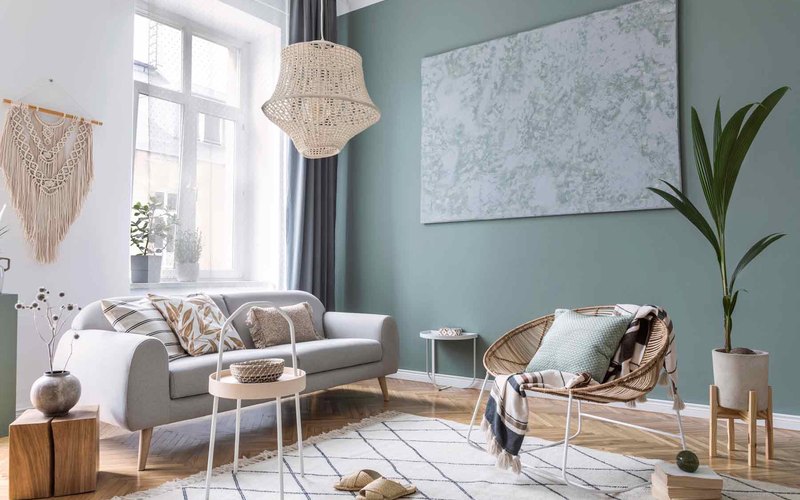 Repainted living room with sage green walls