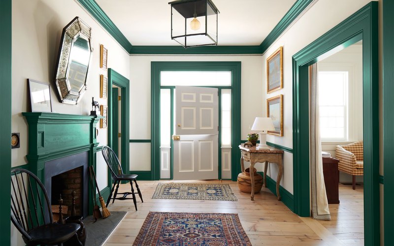 Entryway with fresh emerald green trim and door