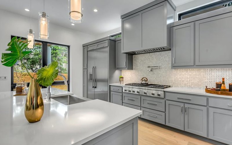 Freshly painted gray shaker kitchen